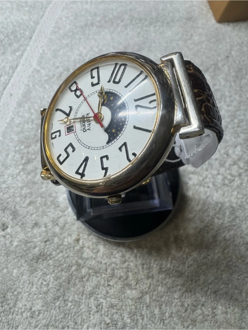 kathy ireland White Dial Moonphase Watch with Gold Accents and Red Second Hand